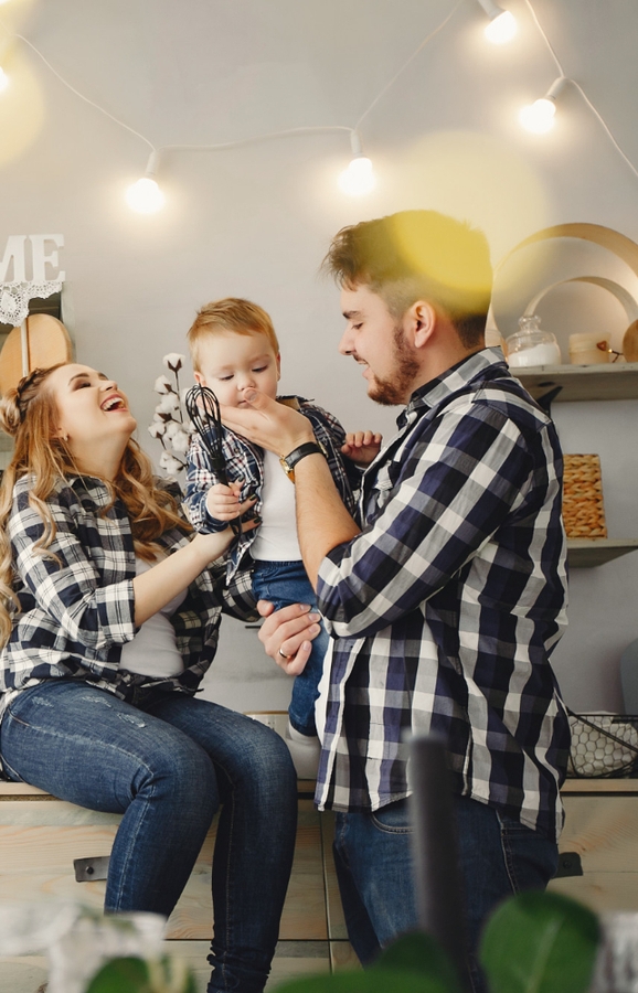 Happy family enjoying their home